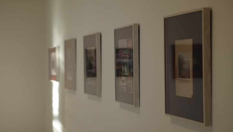 Art Gallery Displaying Art On White Wall