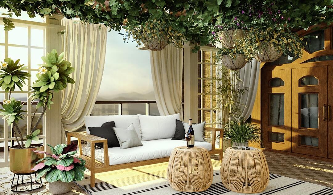 A living room filled with furniture and plants