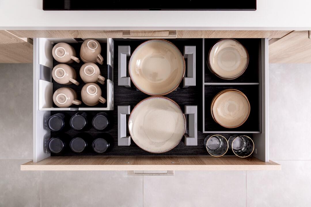 Top Tips For Organising Your Kitchen Cupboards To Maximise Space And Efficiency.